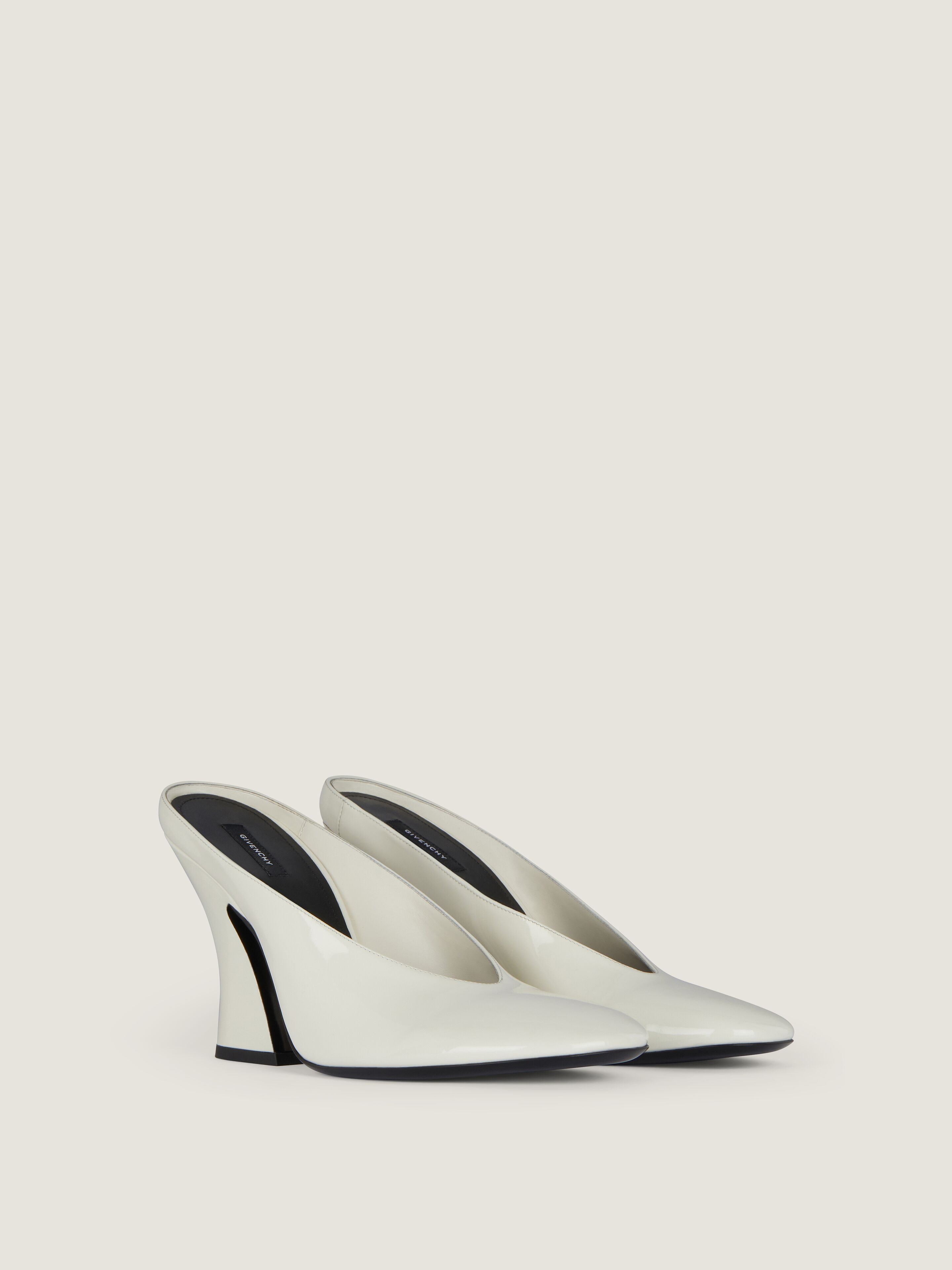 Sculpted heeled mules in patent leather